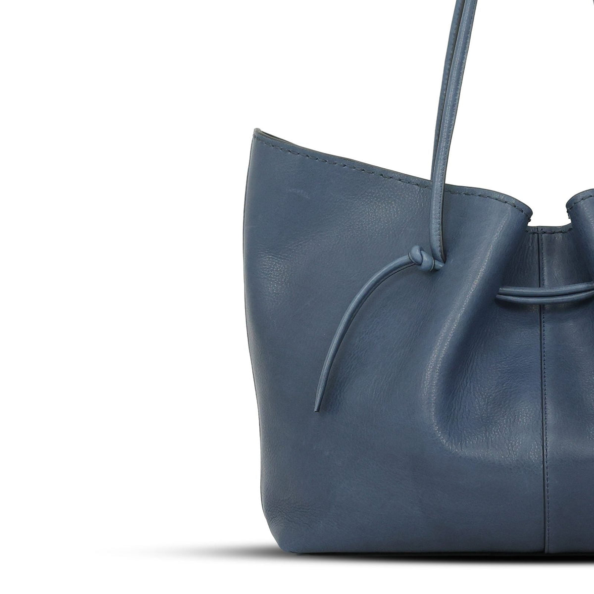 Boat Bag Medium in French Navy leather — leather grain and closure detail