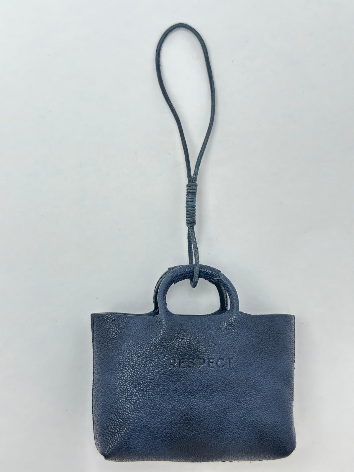 Mini Charm in Cobalt leather — front view