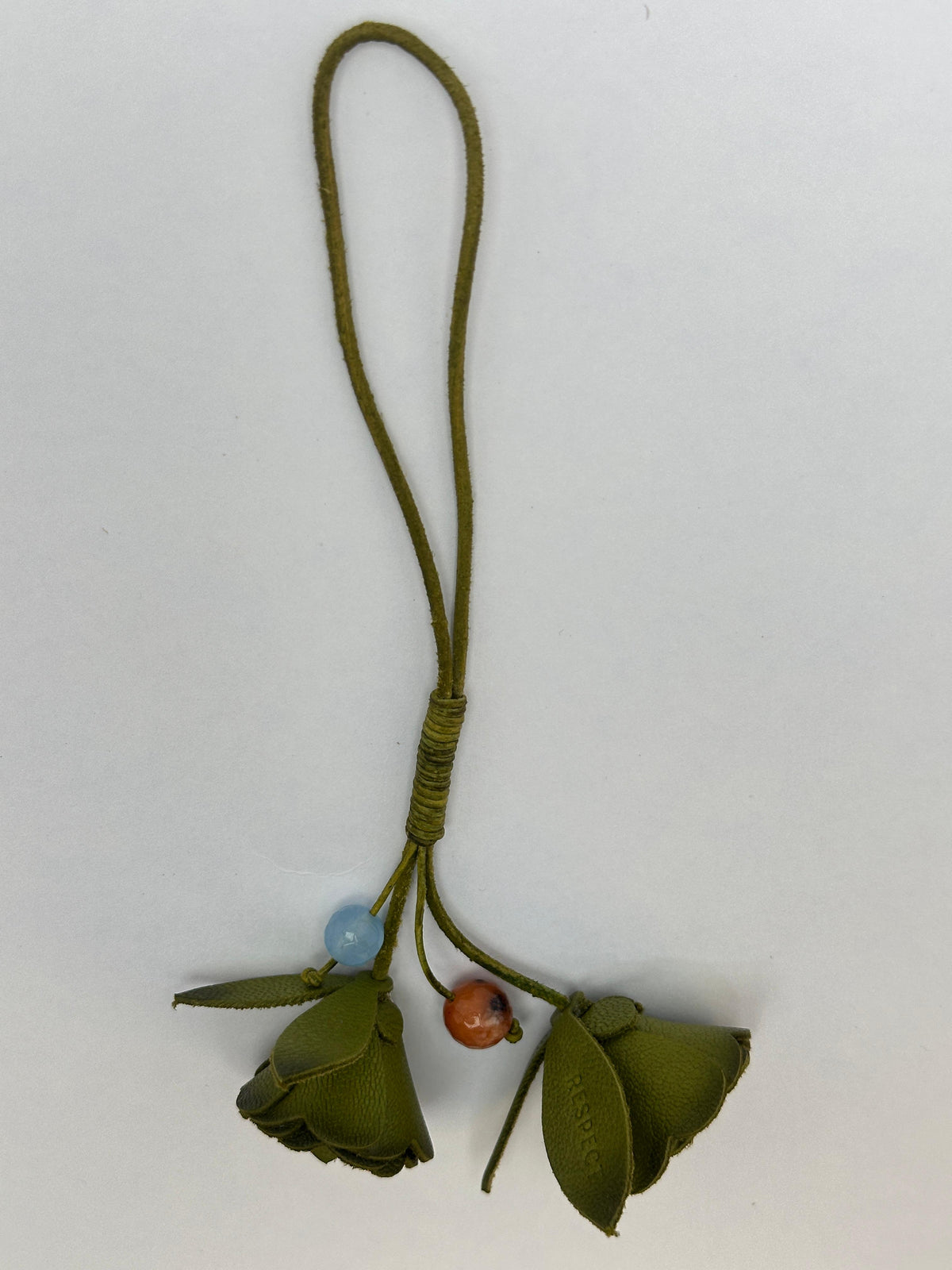 Signature Flower in Olive leather — front view