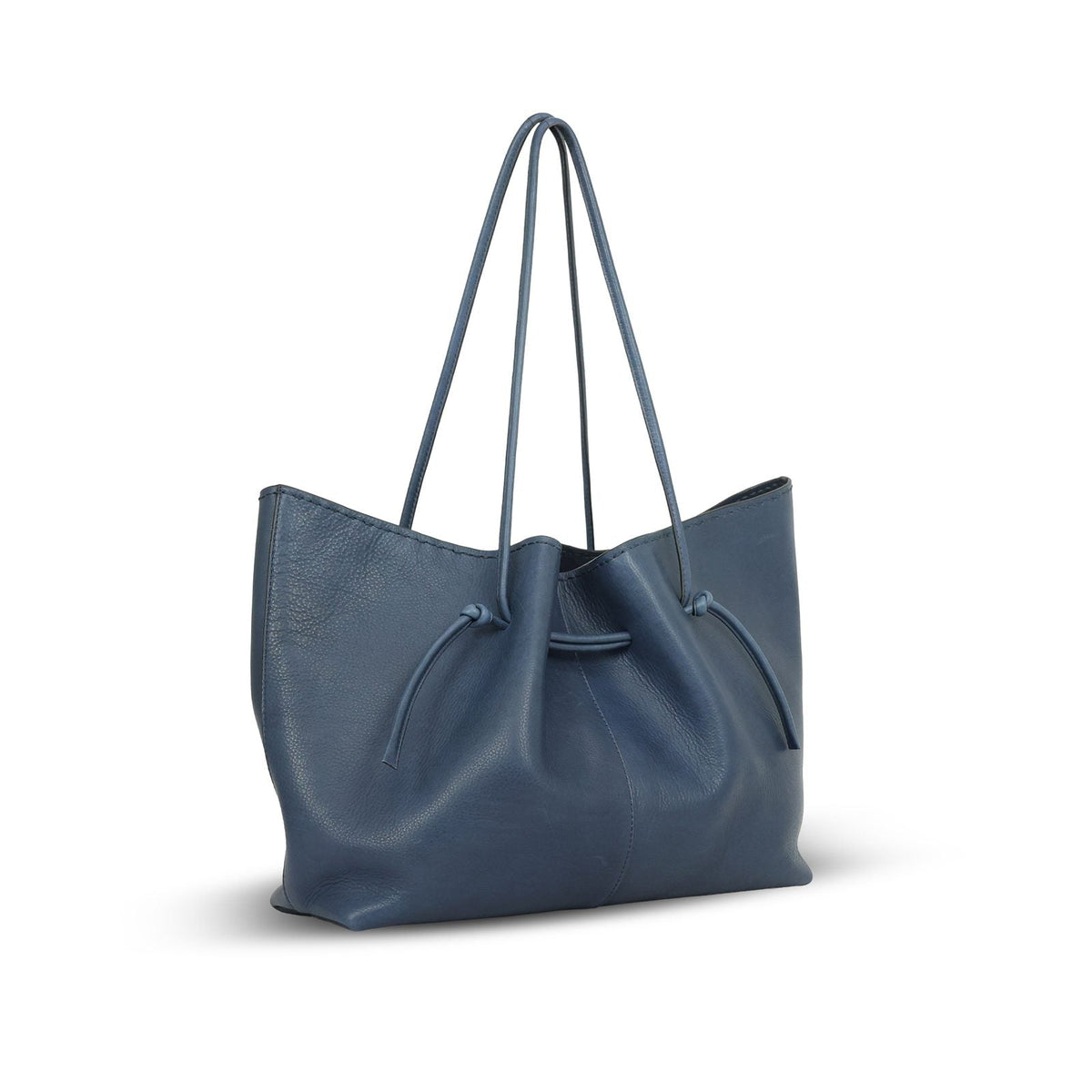 Boat Bag Medium in French Navy leather — three-quarter view