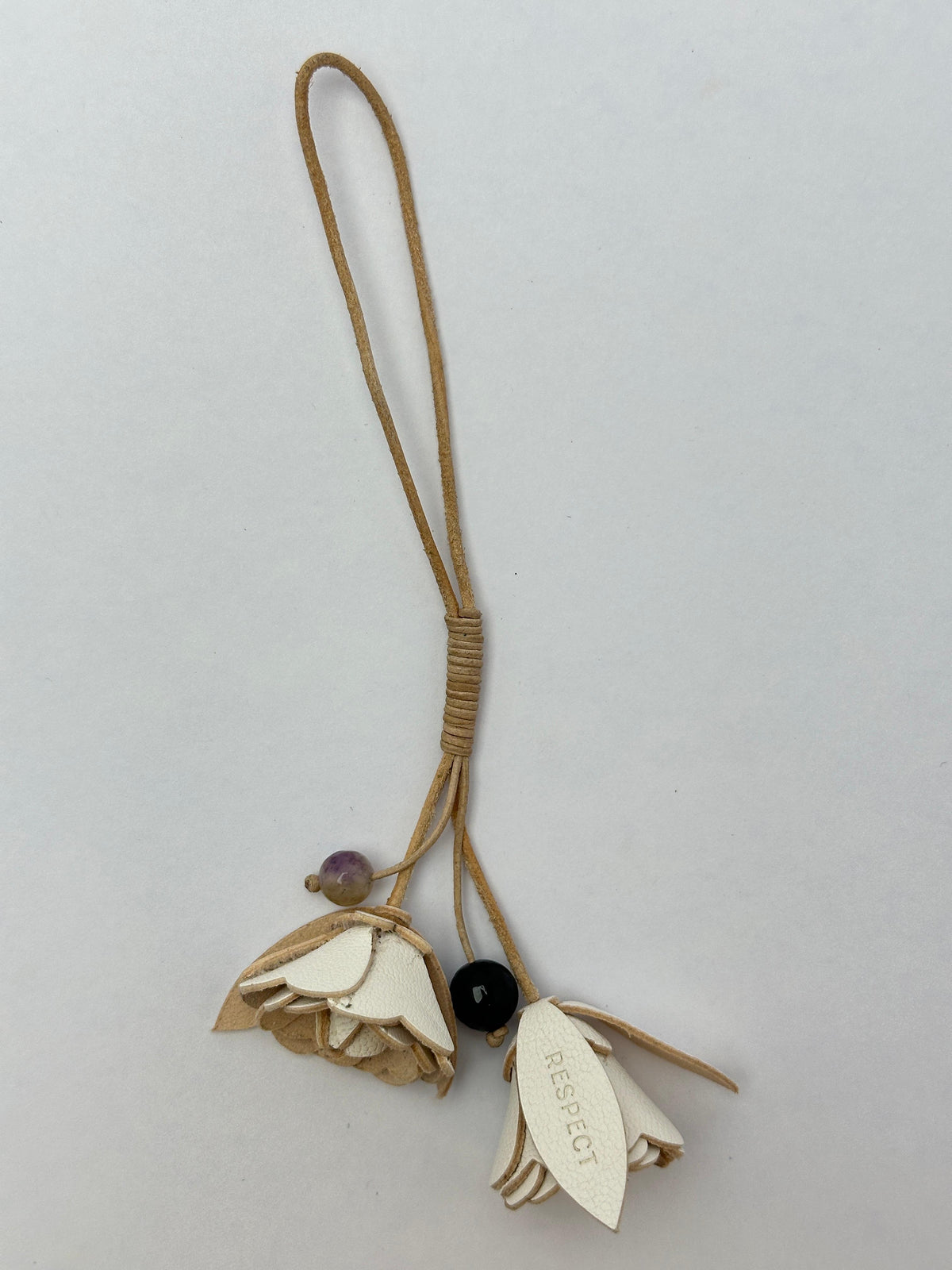 Signature Flower in Moonstone leather — front view