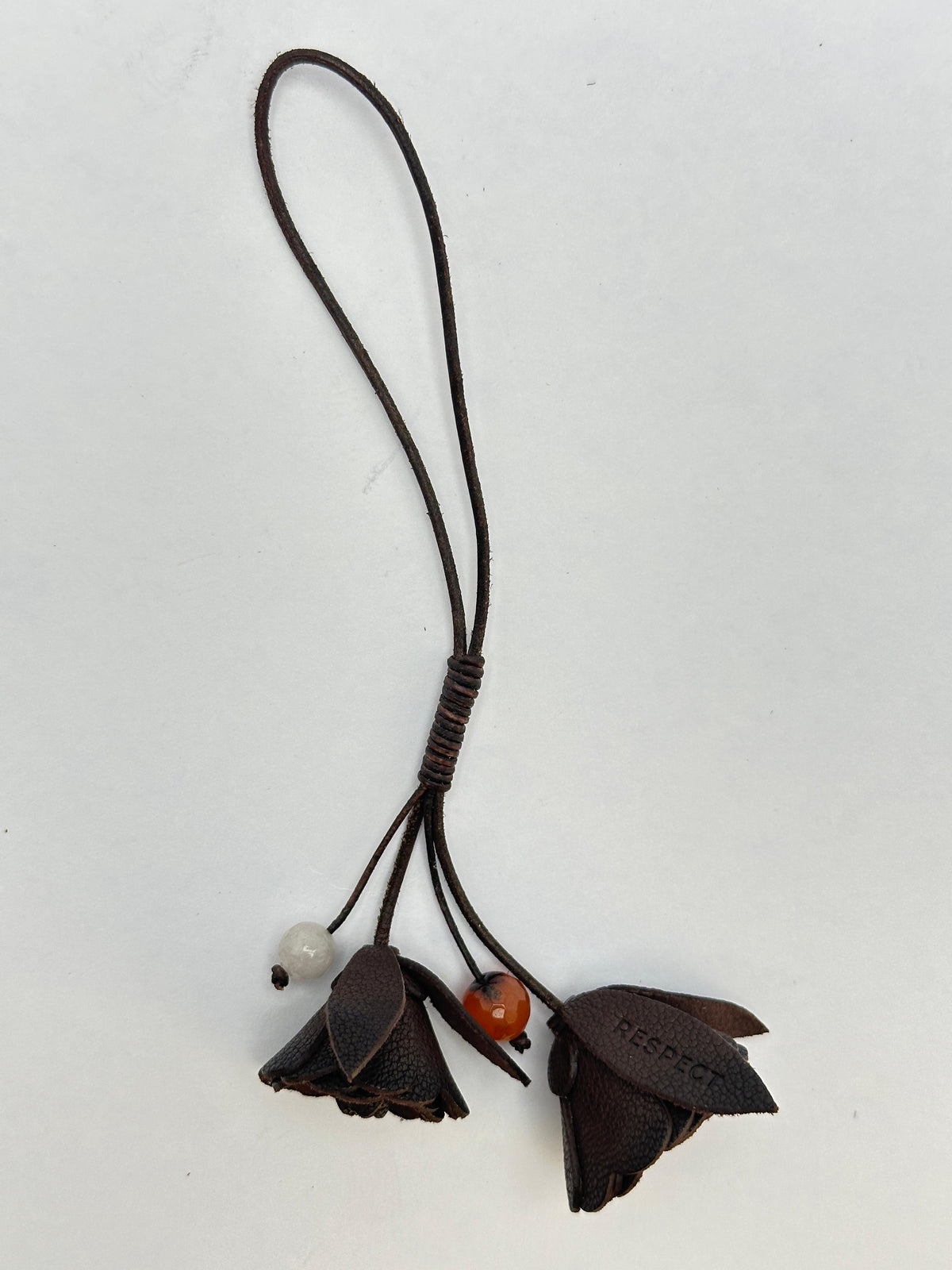 Signature Flower in Testa di Moro leather — front view